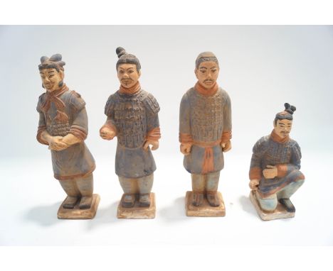 Four Chinese terracotta replica figures of the Terracotta Army, 24cm high