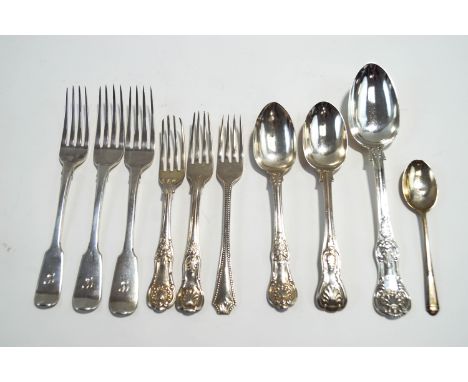 A collection of antique silver flatware, comprising; three fiddle pattern dinner forks; two King's pattern dessert forks; two