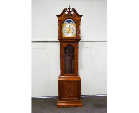 A modern mahogany cased Hermle longcase clock, with three weight chiming movement, weights and pendulum, 210cm high