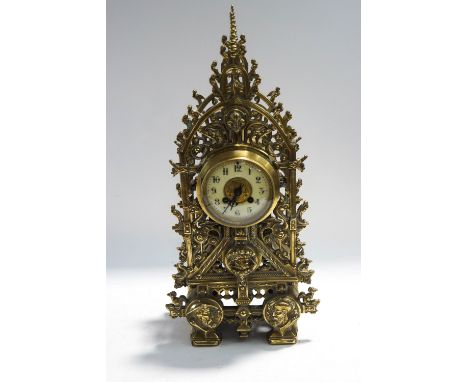 An impressive Victorian Gothic cast brass cased mantel clock, the two train movement by Japy Freres, reputedly made for the P