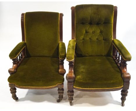 A pair of Victorian mahogany armchairs, each with button backs, with turned legs and casters, 66cm wide
