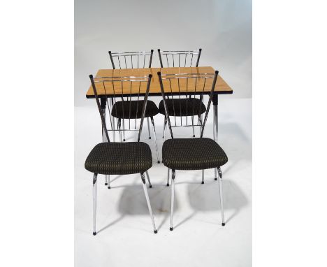 A set of four 1960's chrome dining chairs with padded seats, together with a formica topped dining table with chrome legs, 74