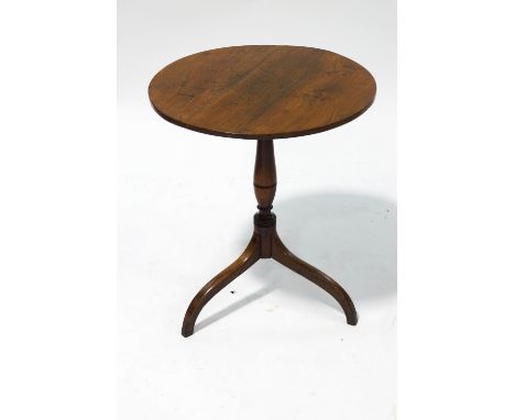 An early 19th century elm tripod table with turned yew wood column on outswept legs, 67cm high x 59cm diameter