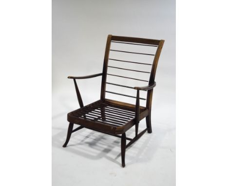 An Ercol 1956 beech armchair frame, shape 248