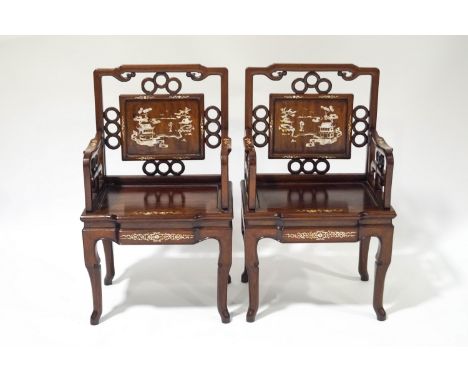 A pair of Chinese elbow chairs, each inlaid with mother of pearl