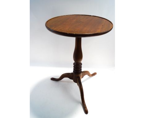 A mahogany tripod table with fixed top, 67cm high x 48cm diameter