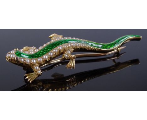 An unmarked gold green enamel pearl and ruby set figural lizard brooch, body set with graduated seed pearls and cabochon-cut 