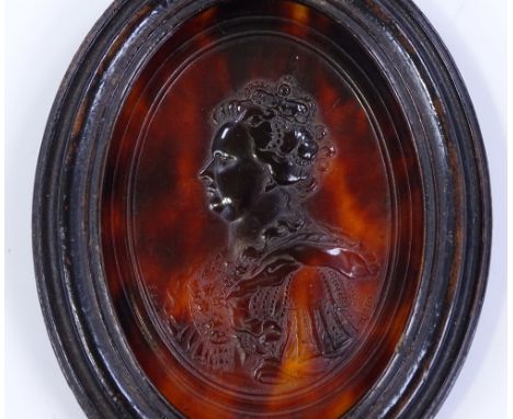 An 18th century pressed tortoiseshell miniature portrait of Queen Anne, by O Brisset 1705, original frame, overall height 10.