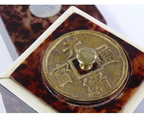 A Chinese square-section tortoiseshell covered tea caddy with coin-mounted inner lid, height 11cm, width 7.5cm