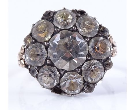 A Georgian paste cluster panel ring, with closed engraved back and scroll engraved shank, setting height 16.3mm, size  M, 4g