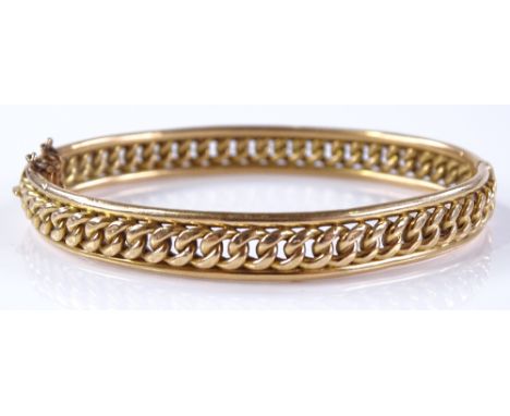 A 15ct gold hinged bangle, with curb link body, internal diameter 58.5mm, 12.5g