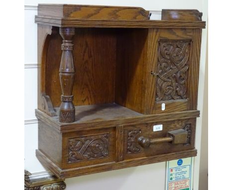 A Russian Arts and Crafts wall cabinet, first quarter 20th century, after the design by Elena Polenova, possibly made at Abra