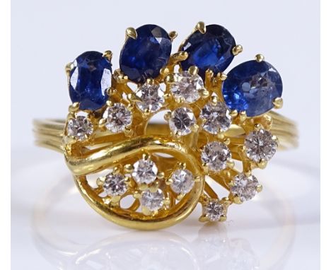 An 18ct gold sapphire and diamond set cocktail ring, setting width 16mm, size U.