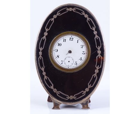 A tortoiseshell and silver inlaid travelling timepiece in strut case, with enamel dial, height 12cm