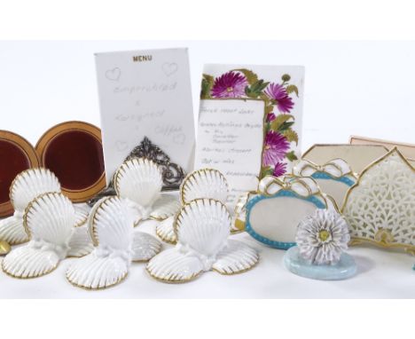 A collection of porcelain and ceramic menu card holders