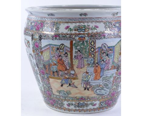 A large Chinese porcelain fishbowl, painted and enamel panels and interior, diameter 47cm, height 42cm