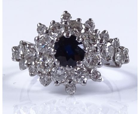 An 18ct white gold sapphire and diamond cluster cocktail ring, setting height 15.8mm, size M, 6.1g