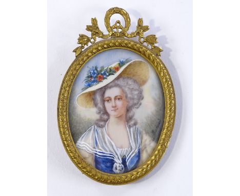 A miniature watercolour on ivory, a portrait of Mme Elizabeth Jardiniere, indistinctly signed, in case ormolu frame, overall 