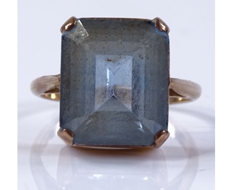 A 9ct gold emerald-cut blue topaz ring, setting height 14.7mm, size P, 5.7g