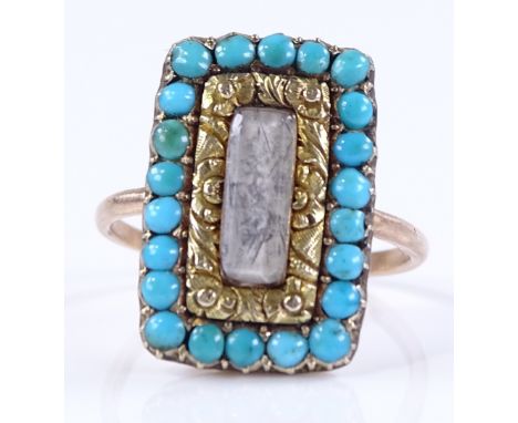 An unmarked gold turquoise memorial panel ring, with central quartz and floral engraved border, setting height 19.5mm, size P