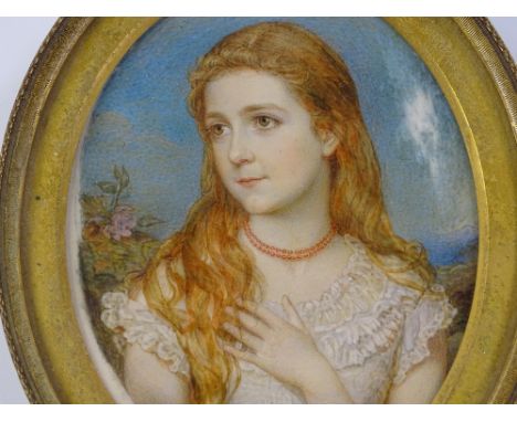 A miniature watercolour painting on ivory, portrait of a young red haired woman, unsigned, in original gilt-metal oval frame,