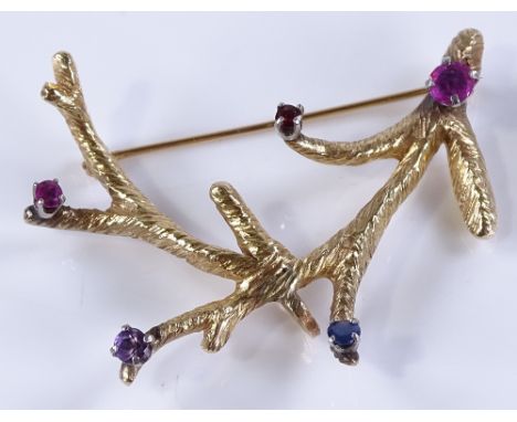 A 1970s naturalistic ruby sapphire amethyst and garnet set branch design brooch, 14ct gold settings, length 45.4mm, 9g