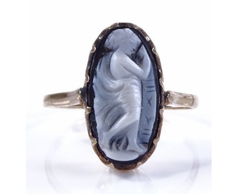 An unmarked gold Victorian carved agate panel ring, relief carved agate depicting female figure, panel height 14.7mm, size K,