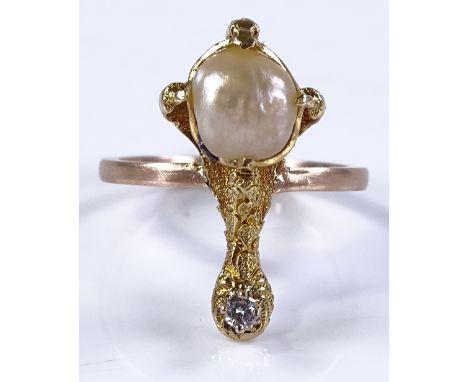 An unmarked gold pearl and diamond claw design ring, setting height 21.5mm, size L, 3.5g