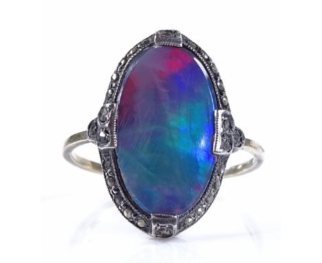 A 9ct gold black opal doublet and marcasite dress ring, setting height 18mm, size L, 2.4g