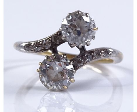 A 1.39ct 2-stone diamond crossover ring, unmarked gold settings, with diamond set shoulders, diamonds approx 0.78ct and 0.61c