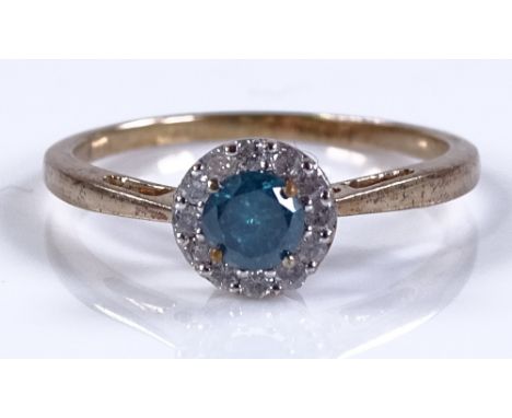 A 9ct gold blue and white diamond cluster ring, central blue diamond approx 0.26ct, setting height 6.6mm, size M, 1.5g