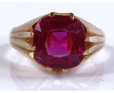 A large pink stone set gypsy ring, unmarked settings test as 15ct gold, size P, 8.8g