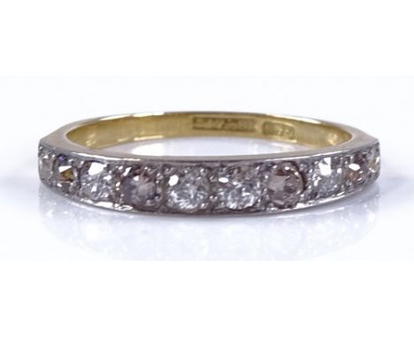 An 18ct gold and platinum-topped diamond half-hoop ring, setting height 3.6mm, size R, 3.3g