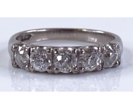 A 14ct white gold 5-stone diamond half-hoop ring, total diamond content approx 0.97ct, setting heigth 4.1mm, size K, 3.1g