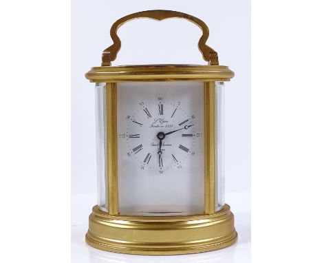 A good quality modern L'Epee brass-cased carriage clock in oval case, height 12cm, boxed