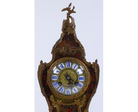 A French boulle marquetry cased mantel clock, early 20th century, in elaborate ormolu mounted case, with enamel and gilt-meta