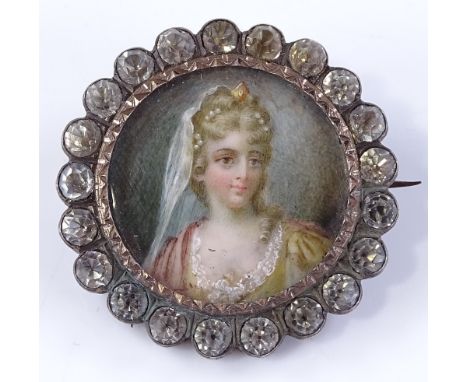 A miniature portrait brooch, in paste surround, unmarked white metal settings, diameter 31.44mm, 9.4g