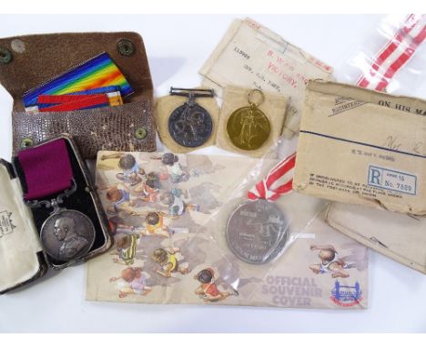 A group of 3 First War Service medals, comprising British War medal, Long Service and Good Conduct medal, and Great War Victo