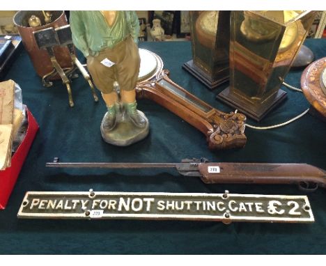 A British Railways cast iron sign: Penalty for not shutting gate £2.