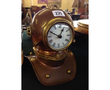 A novelty Diver's helmet clock.