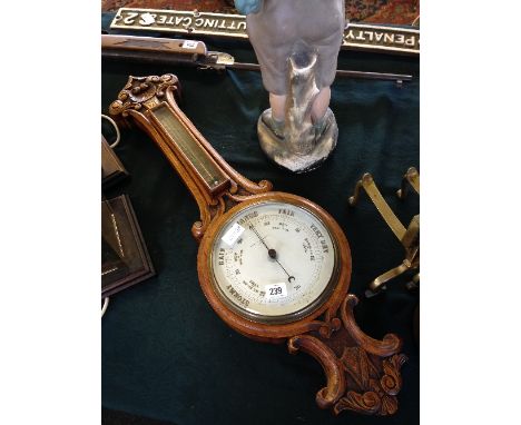 An oak cased barometer by Rose & Dickenson, Bath.