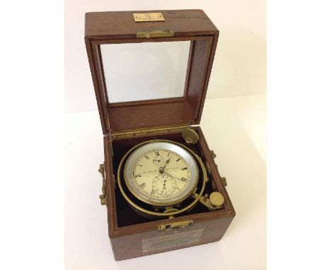 A brass cased German Marine chronometer Veb Glashutter Uhrenbetriebe, No. 7188, the oak case with brass side handles, the dia