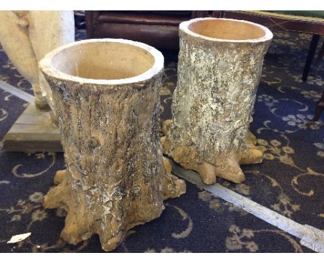 A pair of early 20th century Bourne Valley Pottery terracotta tree trunk planters.