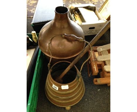 A copper flask together with a copper bucket and wooden ladle.