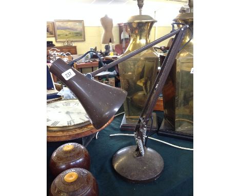 A modern angle poise lamp. 