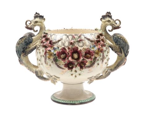 quite big antique "Barbotine" bowl in ceramic with a decor of flowers and with dragon-shaped grips || Vrij grote antieke "Bar