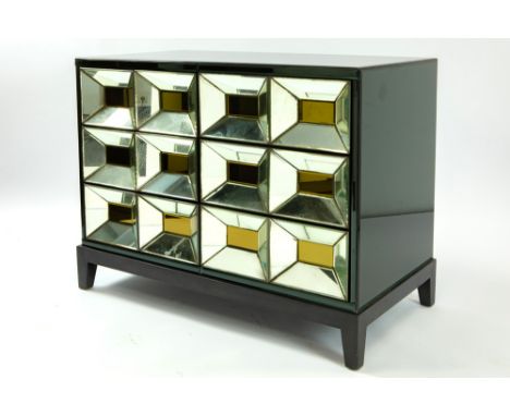 Olivier De Schrijver signed "Ducale" design cabinet with gold coloured casettes and black mirror glass and with two doors and