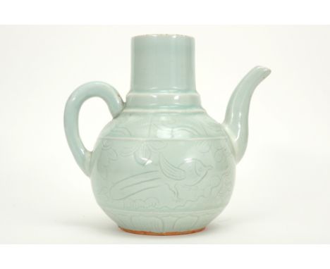 Chinese pitcher in celadon porcelain with underlying decors || Chinese kruik in celadon porselein met onderliggend decor  -  