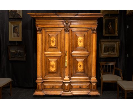 beautiful 17th/18th Cent. German baroque style armoire with a strong architectural design with flat columns with sculpted cap