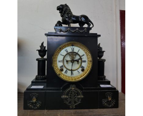 A Belgian slate mantel clock with American movement with bronze lion, mounts and columns 